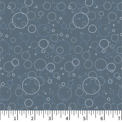 Pattern of white bubbles on a blue background with a ruler at the bottom.